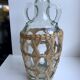 Bottle with handle and covered with wicker / rattan 70s