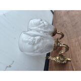 Pair of brass wall lights and glass paste.