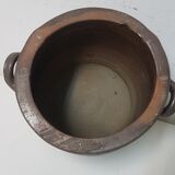 Old varnished sandstone pot