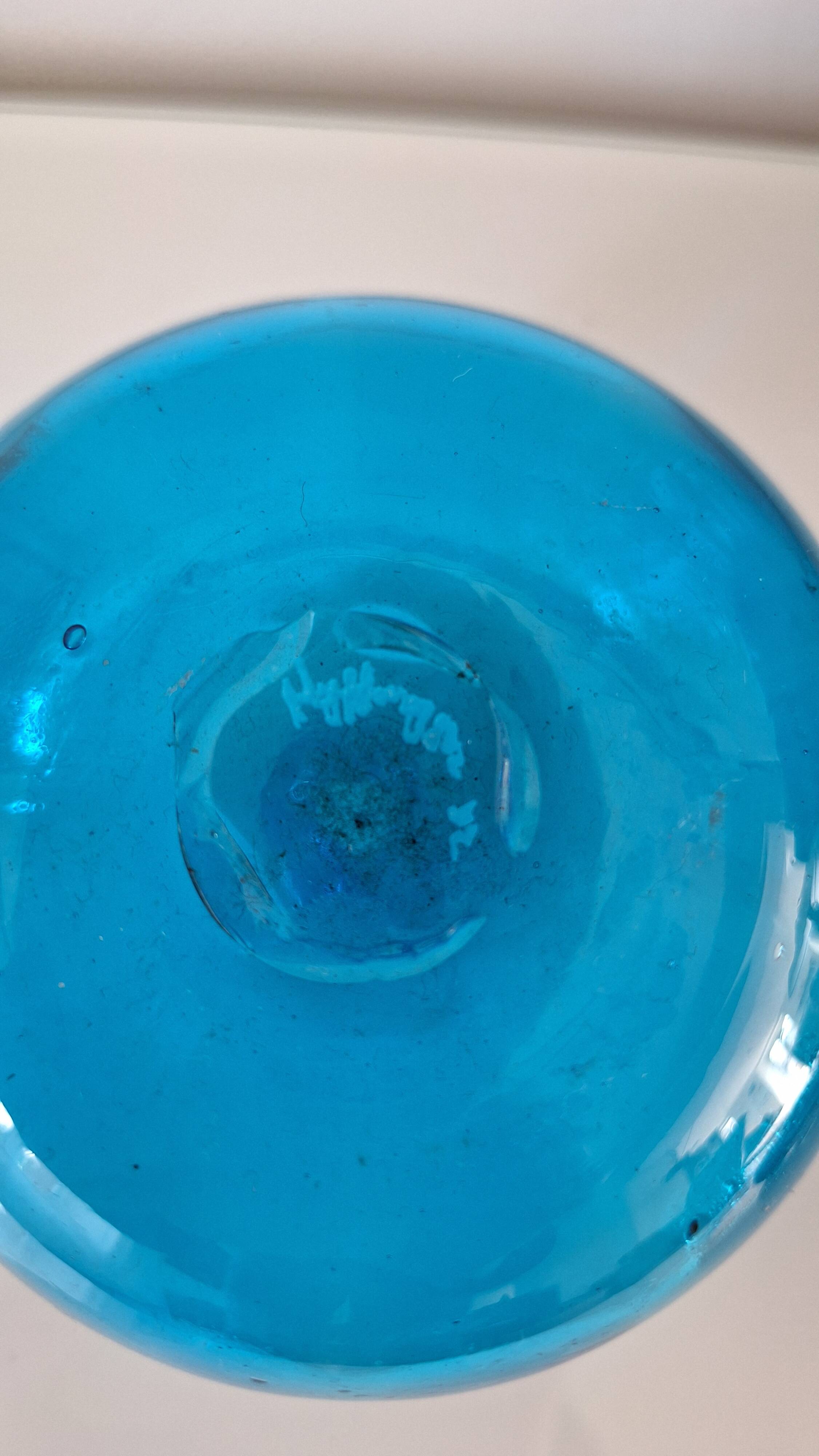 Turquoise blue blown glass vase
