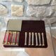 Lot of 12 crystal and gold metal knive holders