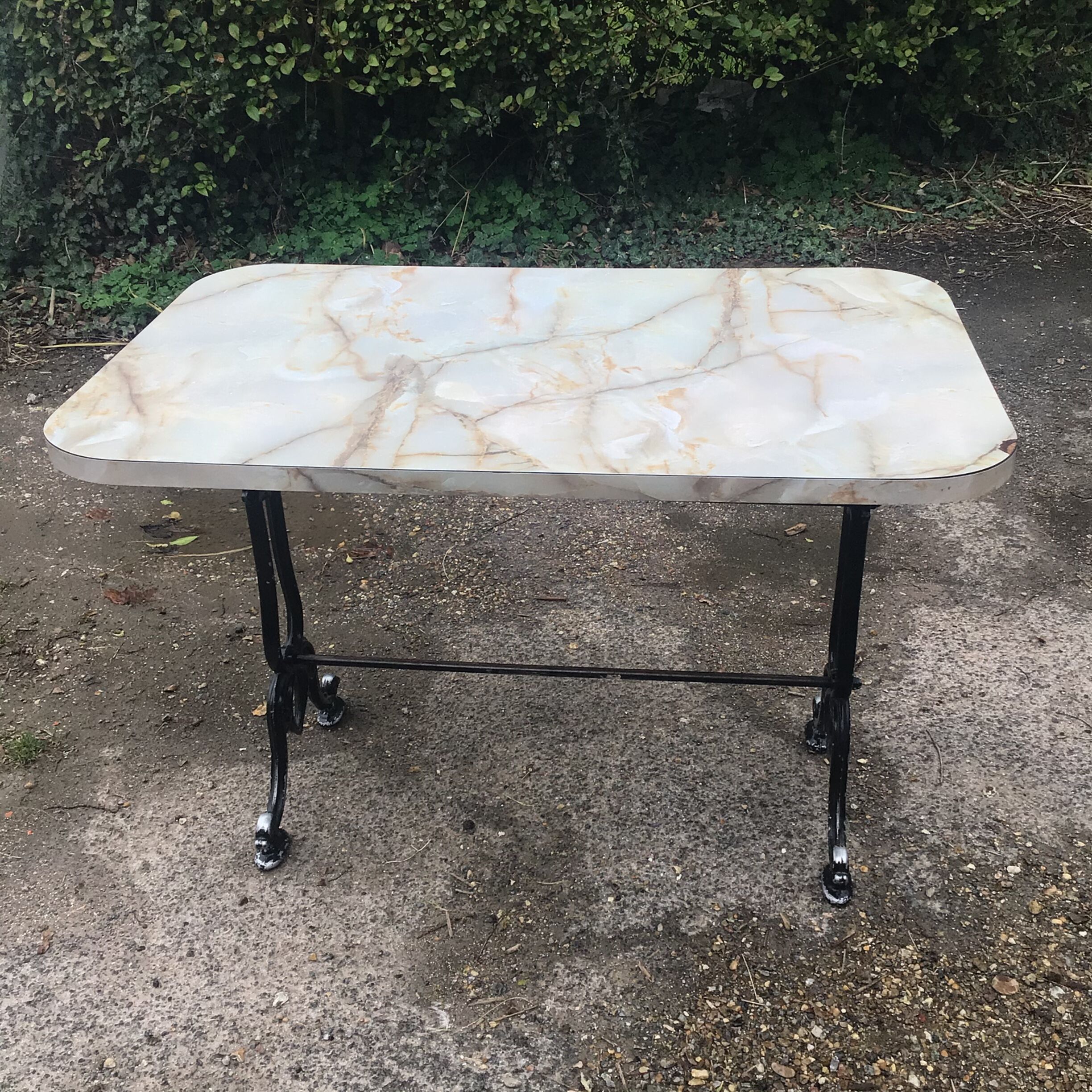 Cast-iron bistro table with marble effect