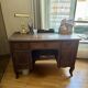 Solid wood desk from the early 20th century.