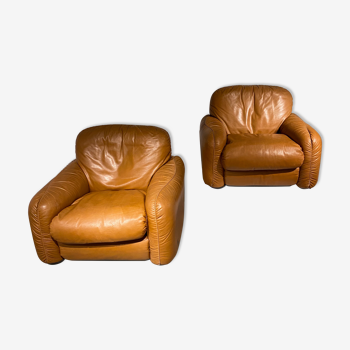 Pair of Busnelli armchairs in cognac leather