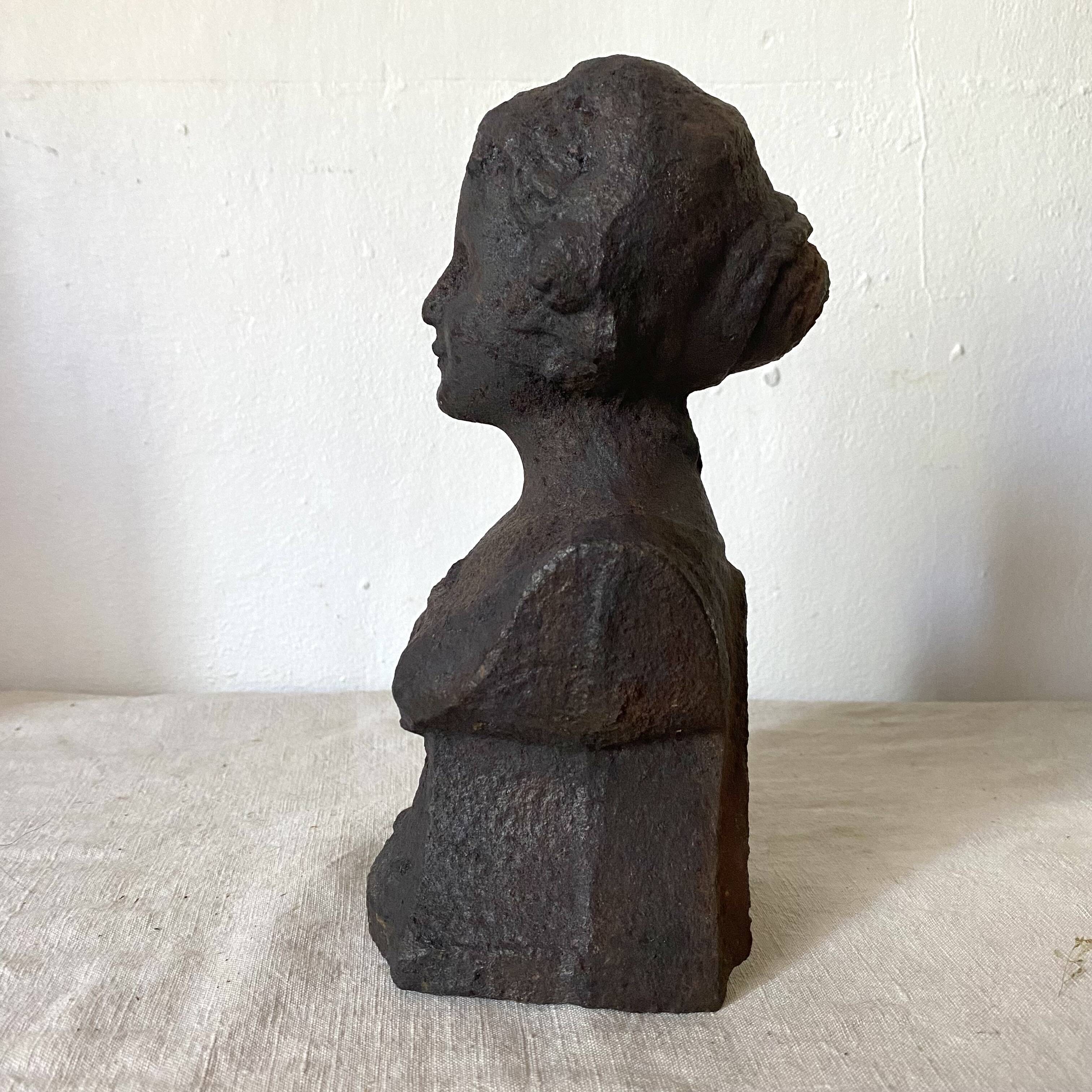 Cast iron bust door stop or bookend