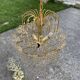 Mid-century chandelier and 2 wall sconces in gilded brass and clear glass, 1960s.