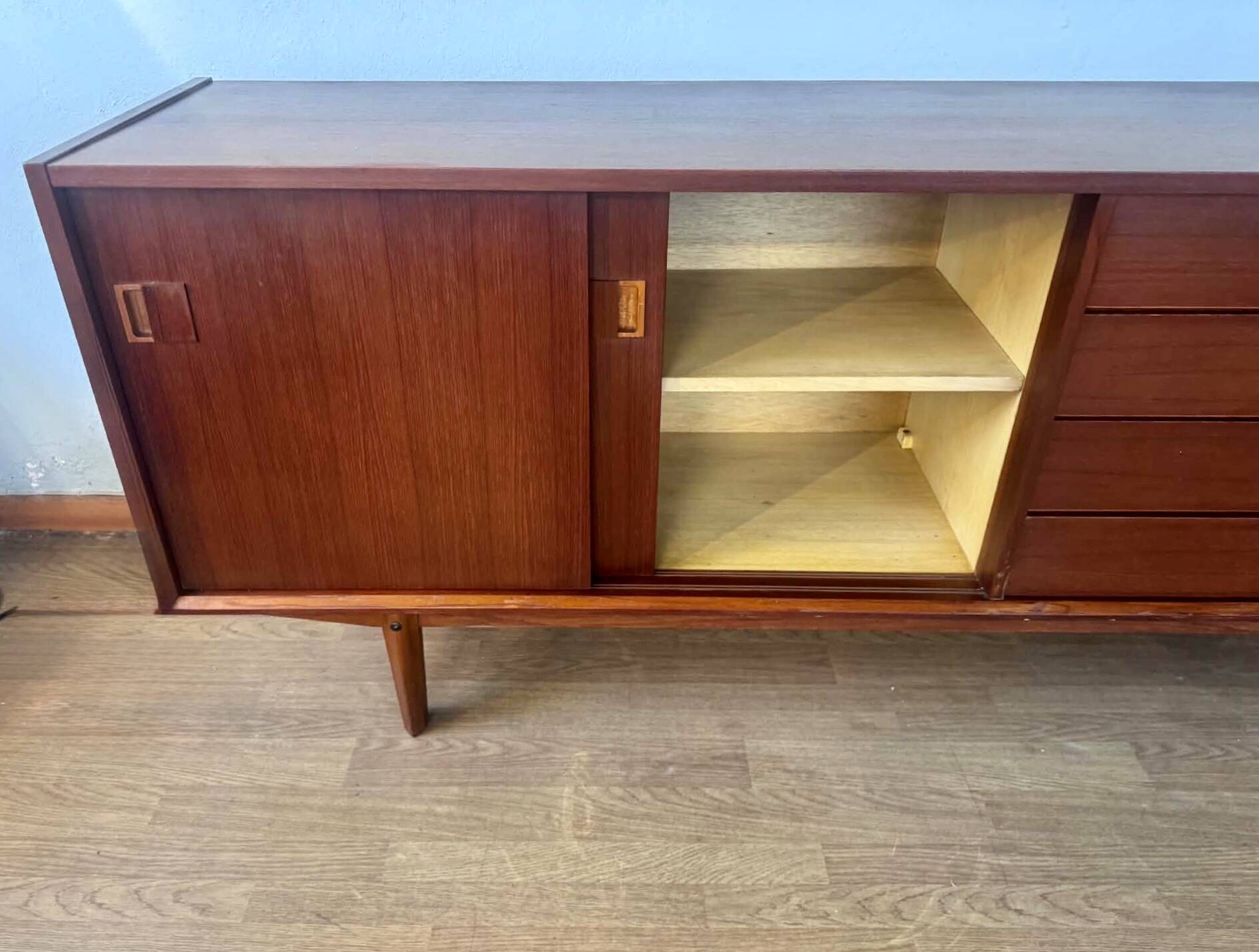 Scandinavian teak sideboard, 230 cm long, with 3 doors and 4 drawers.
