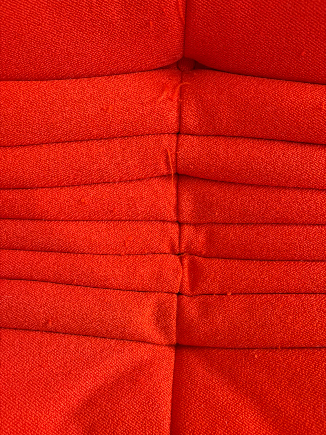 Togo 3-seater sofa by Ligne Roset, Vidar Carrot fabric.