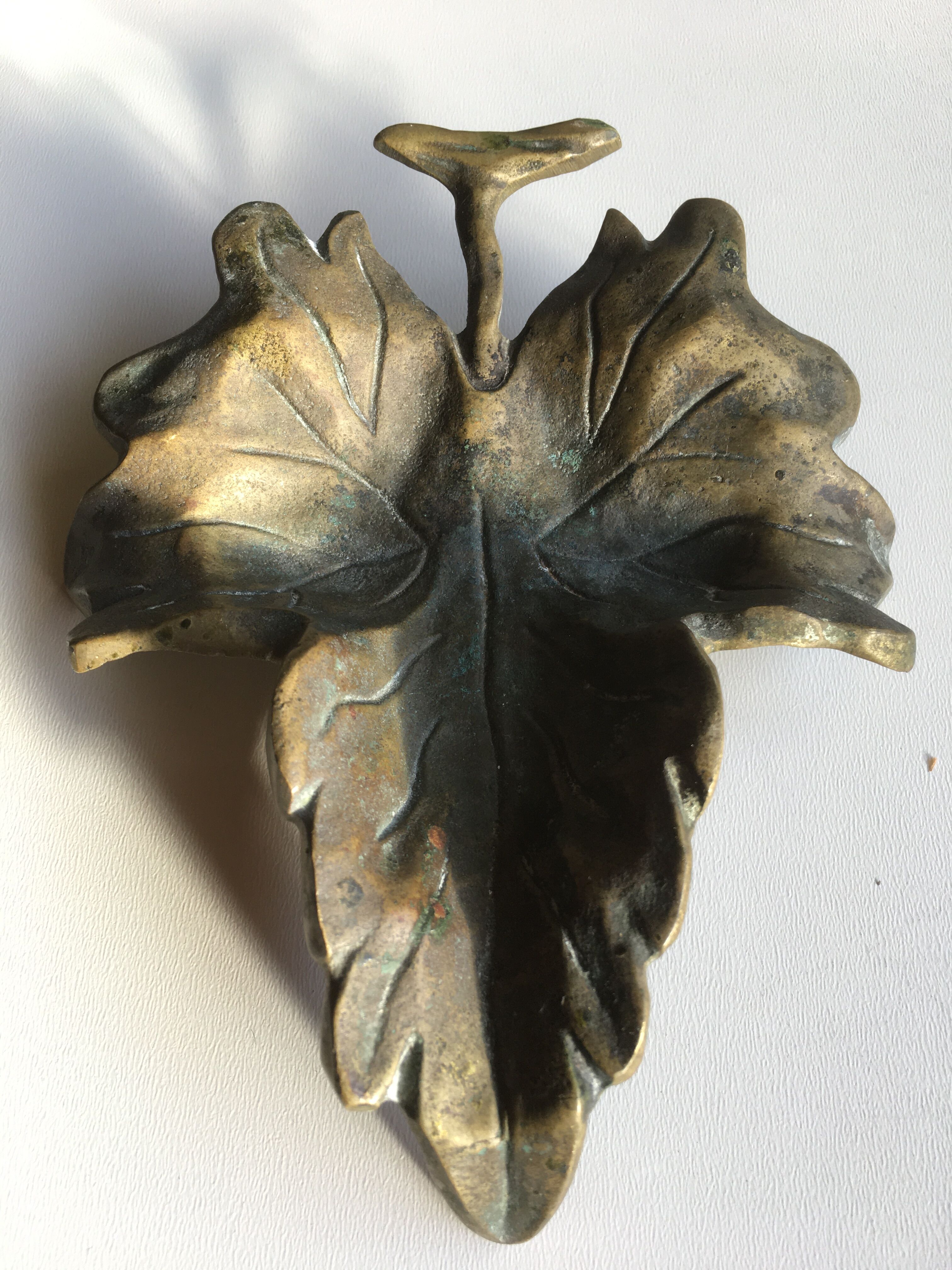 Empty pocket or ashtray leaf in old bronze