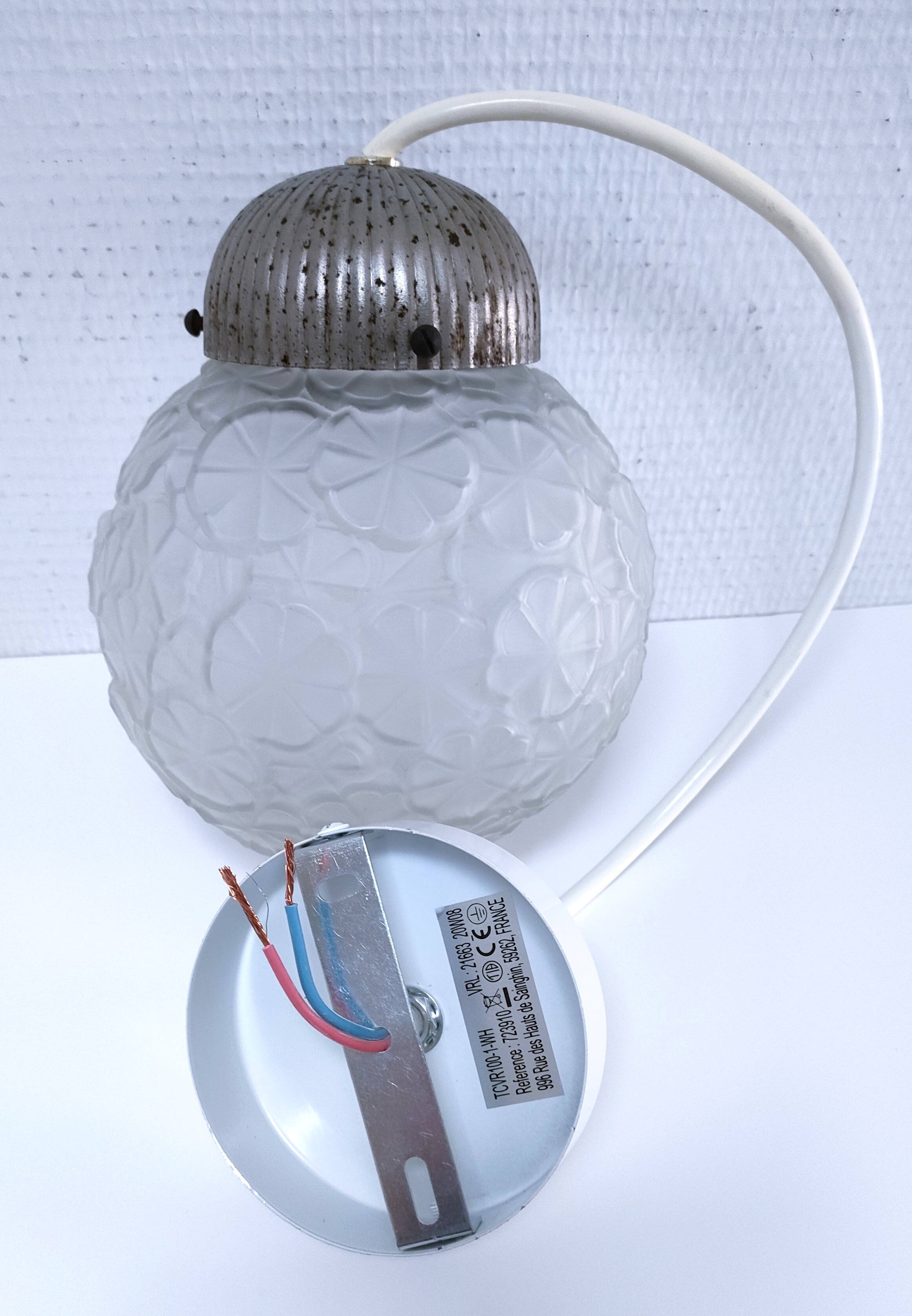 Art Deco glass ball pendant with floral decor
