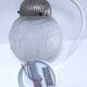 Art Deco glass ball pendant with floral decor