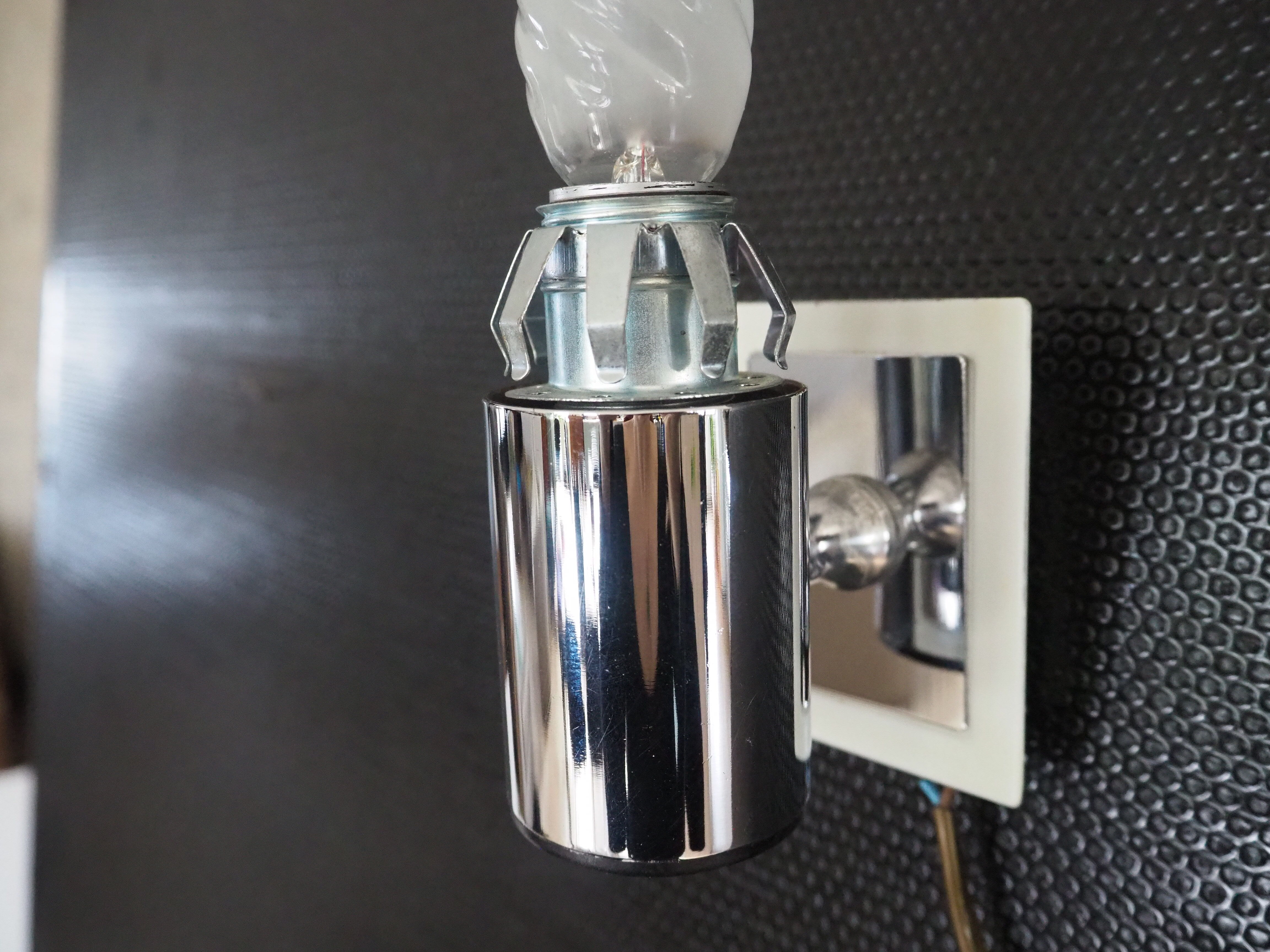 Torch type wall lamp in transparent and white glass