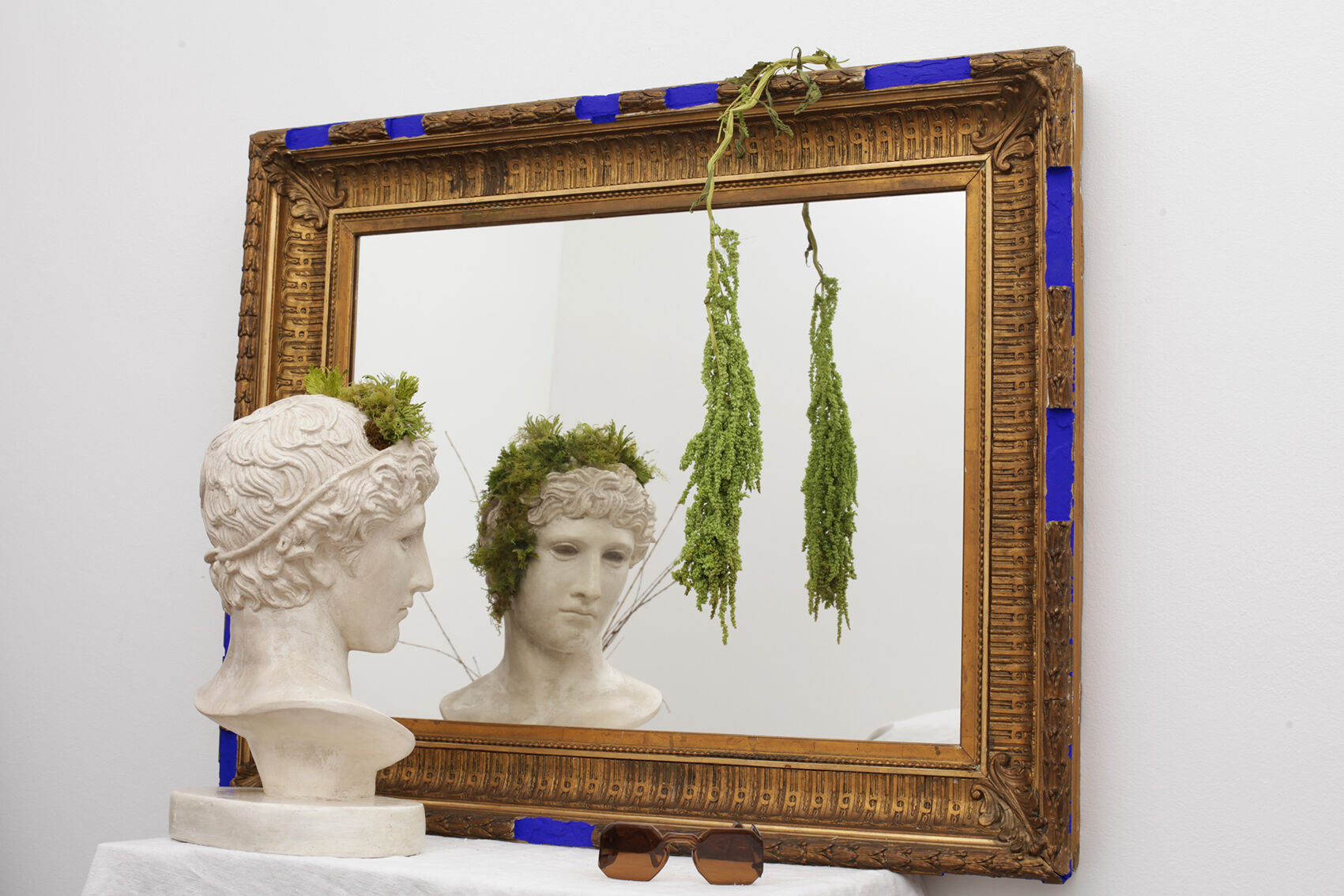 Golden antique mirror with leaf and bright king blue