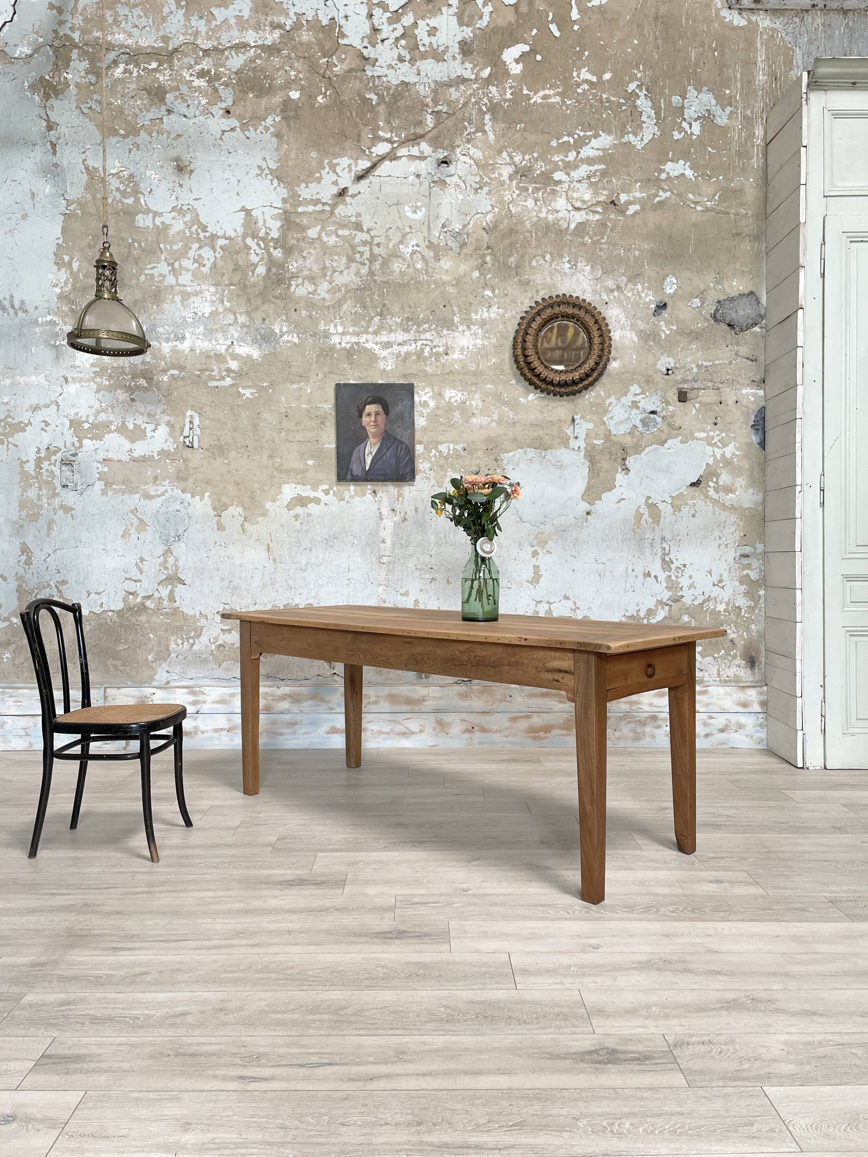 Vintage farmhouse table with spindle legs.