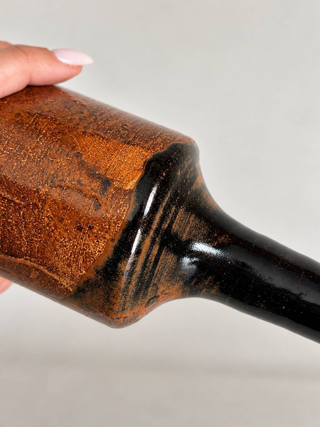 Brown and black glazed stoneware single flower vase, antique handmade pottery.