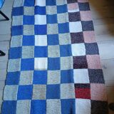 Hand knitted patchwork plaid
