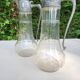 Pair of crystal and pewter jugs