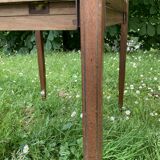 Glass-enclosed old tea table with wooden tray, bronze and brass