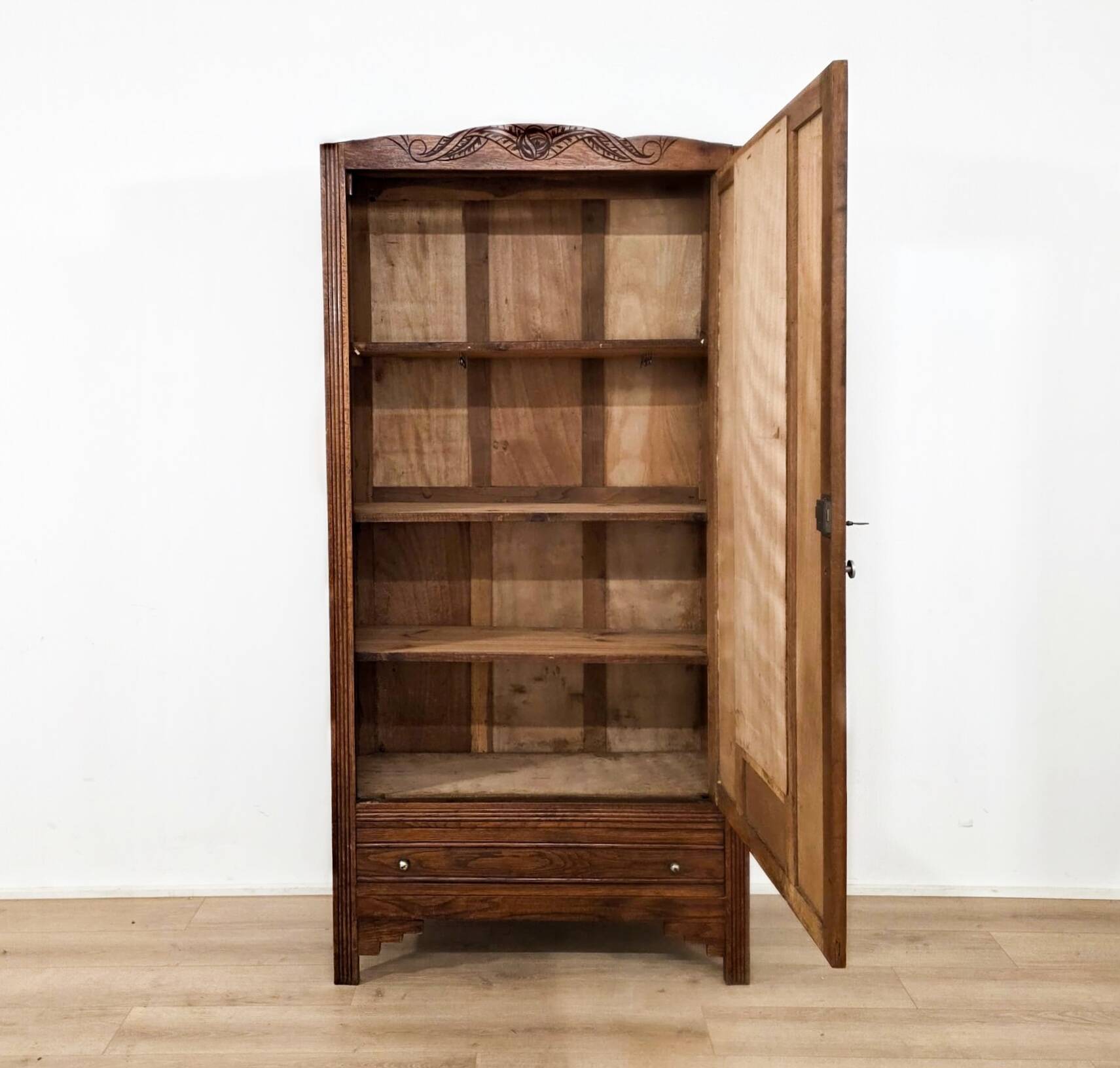 Art Deco wardrobe in solid wood with mirror from the 1920s.