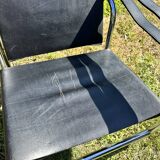 Paire de fauteuils en cuir et acier