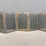 Antique fireplace screen in copper and brass from the 19th century.