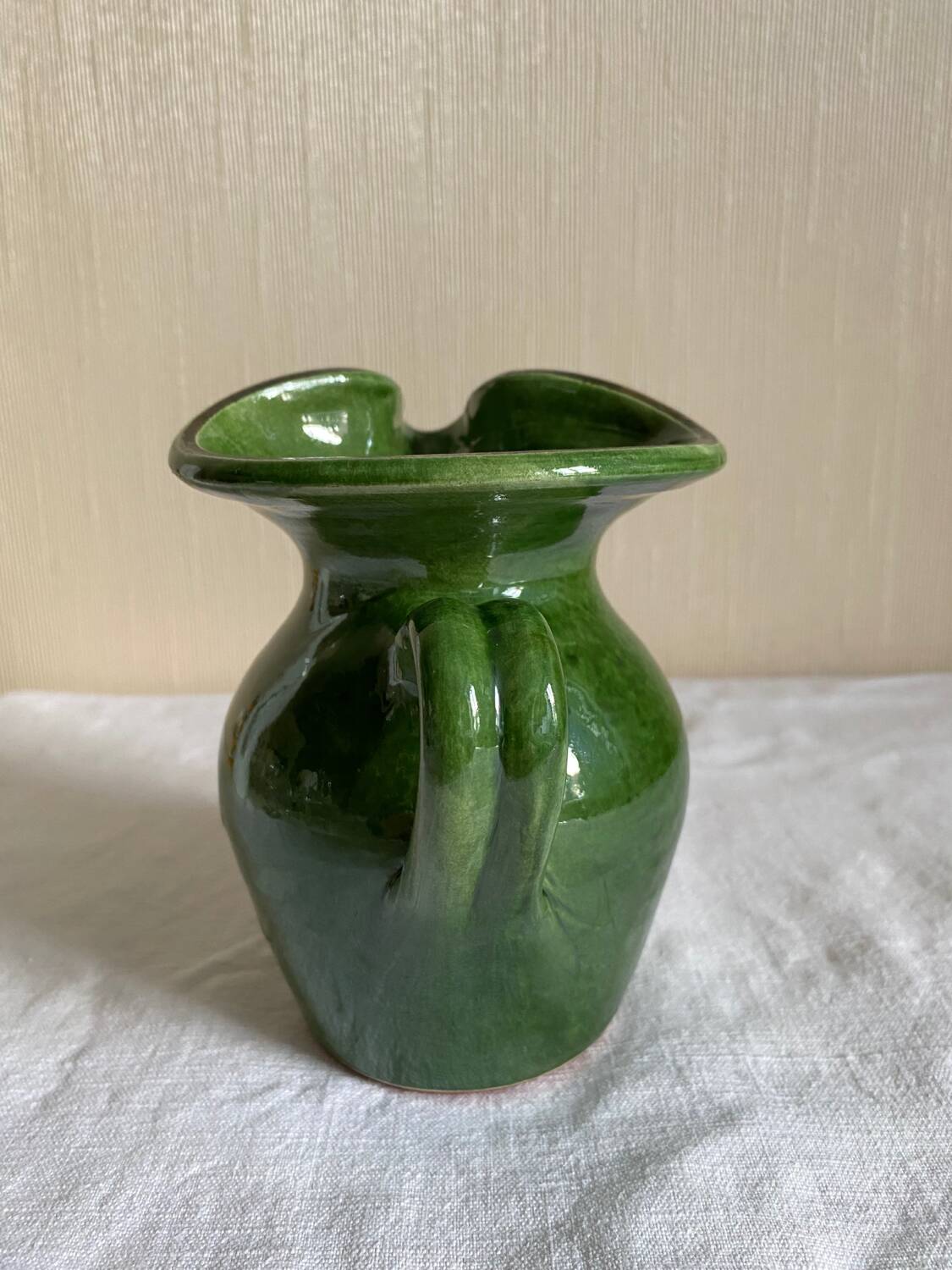 Provençal pitcher in green glazed earthenware