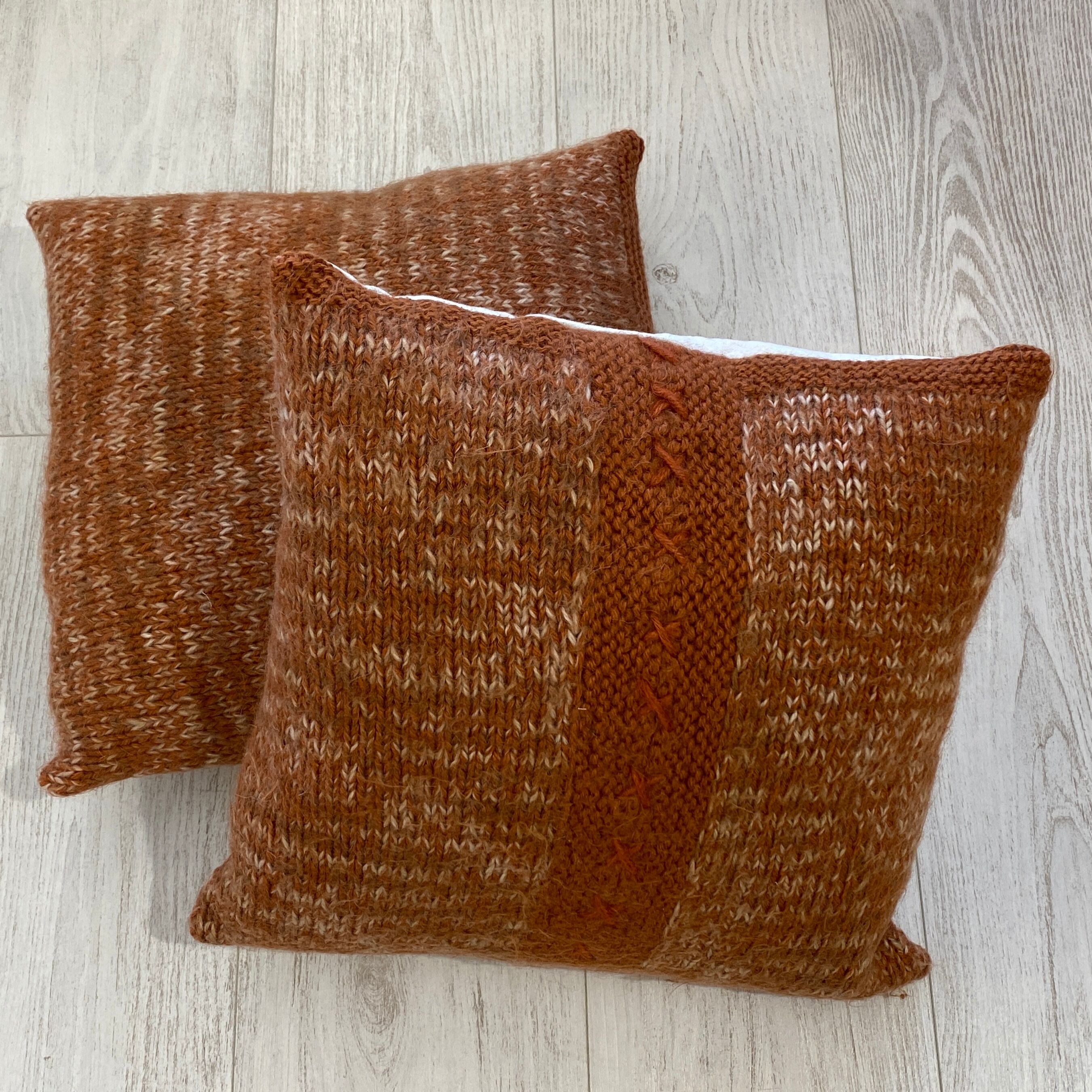 Pair of retro terracotta wool knit cushions