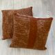 Pair of retro terracotta wool knit cushions