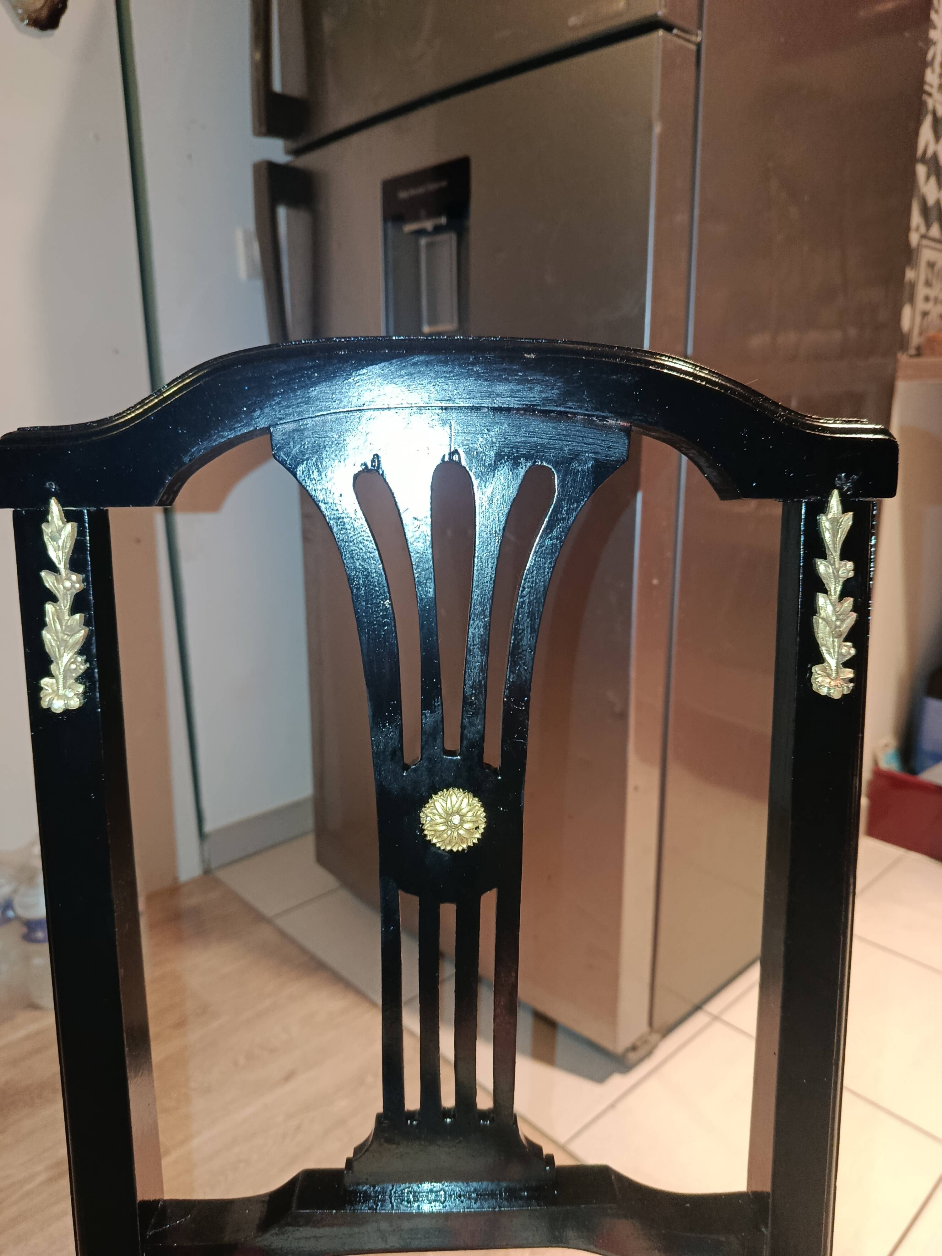 Pair of Hepplewhite neoclassical style chairs, relooked in black lacquer and faux leather.