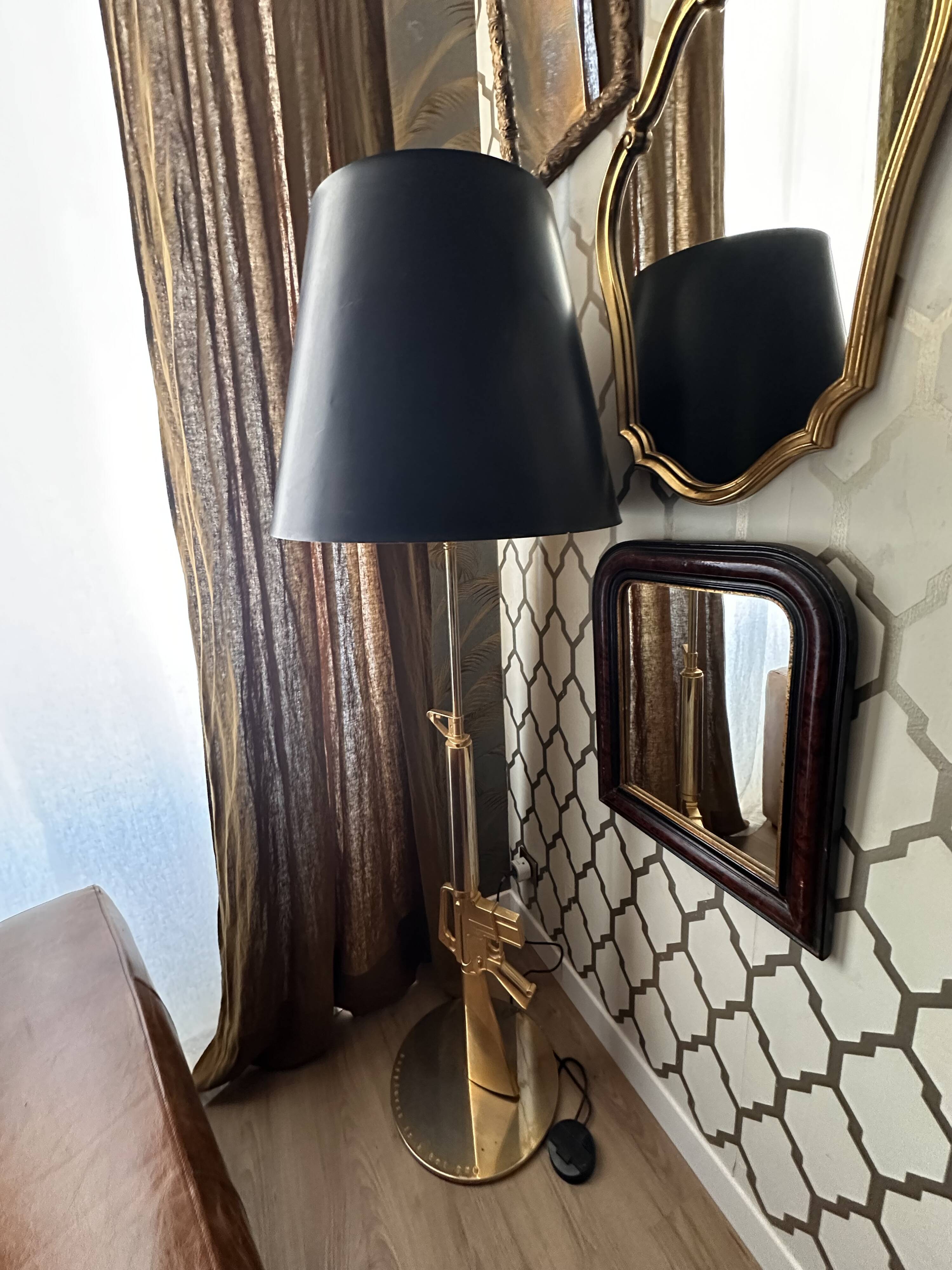 "Lounge Gun" floor lamp by FLOS by Philippe Starck – Gold