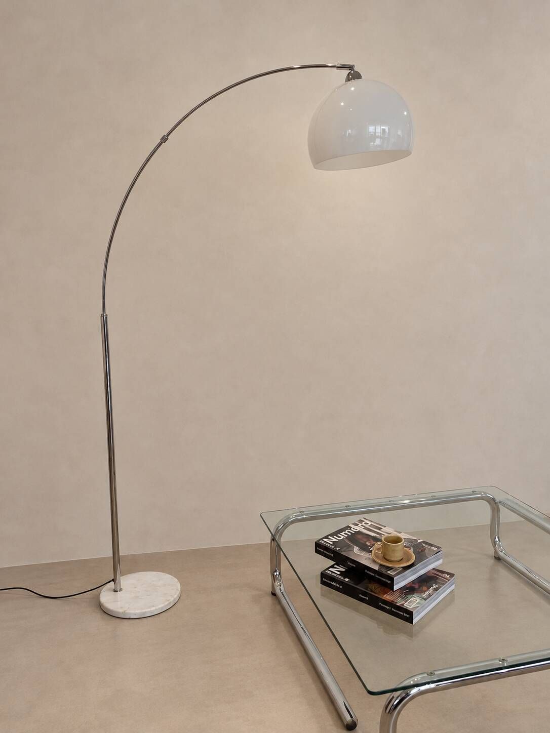 Arc floor lamp with a marble base