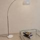 Arc floor lamp with a marble base