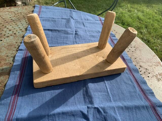 Small bench, footrest in artisanal raw wood