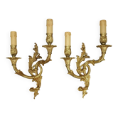 Large pair of wall sconces in Rocaille / Rococo / Baroque style - gilded bronze
