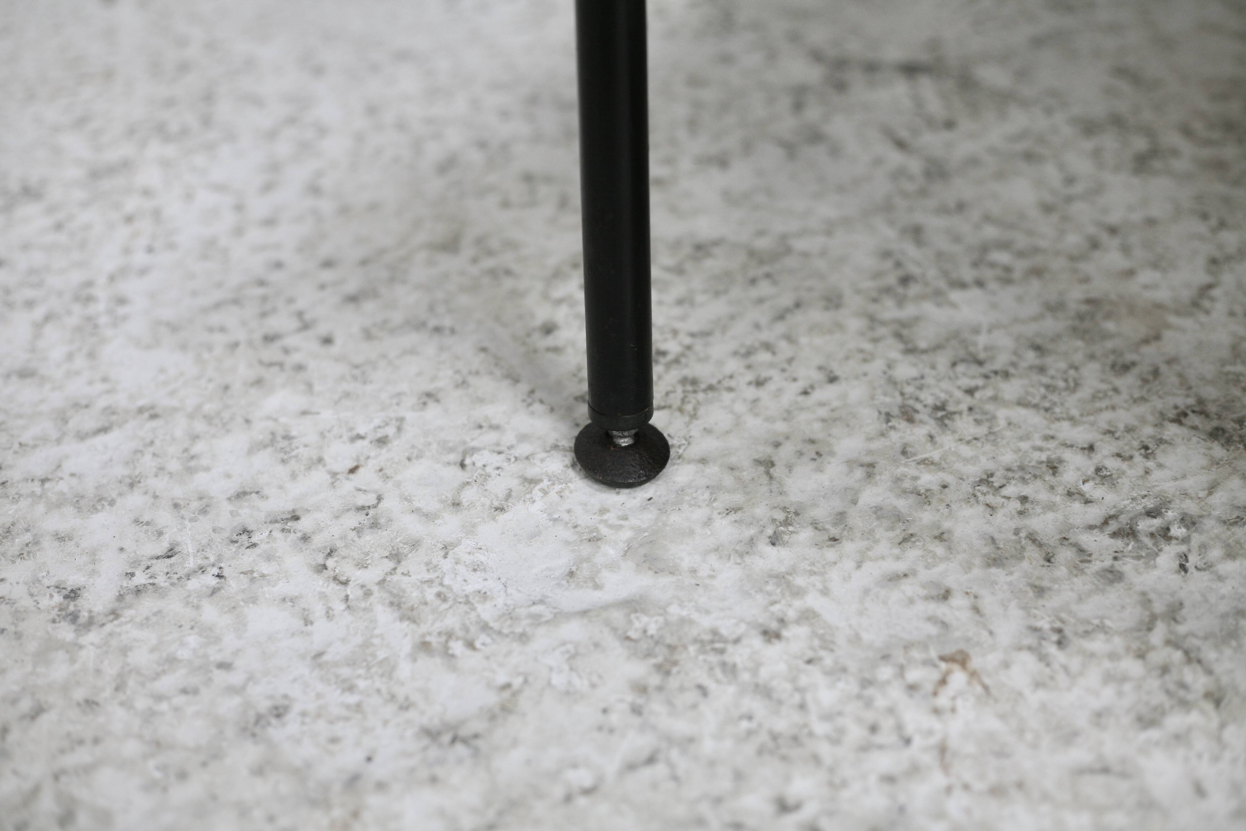 Low chair, circa 1950. Brown imitation leather.