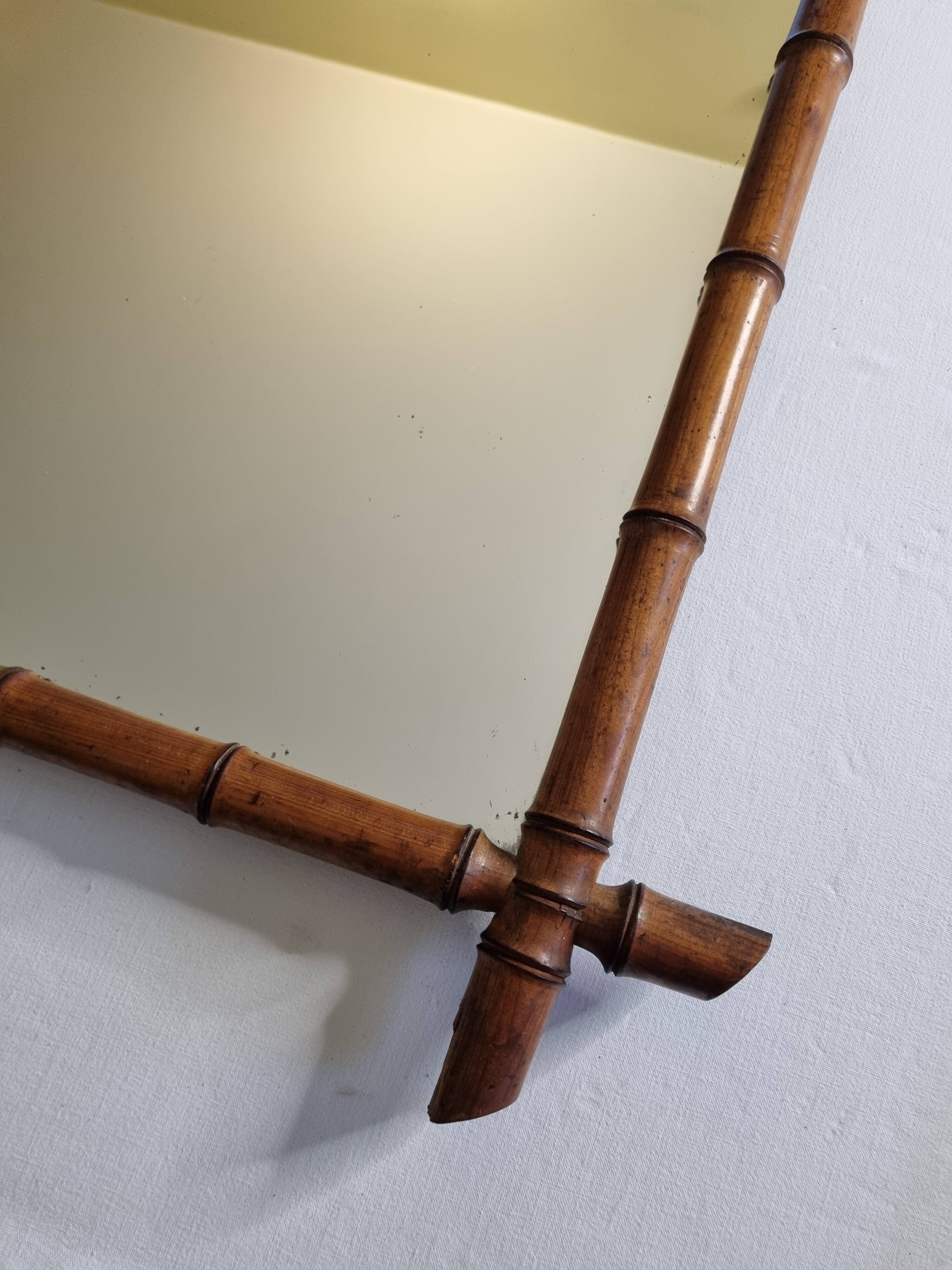 Large turned wooden bamboo mirror, 55 x 78 cm, circa 1900