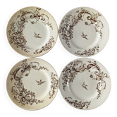 4 assiettes plates en terre de fer marron à décor d'oiseaux