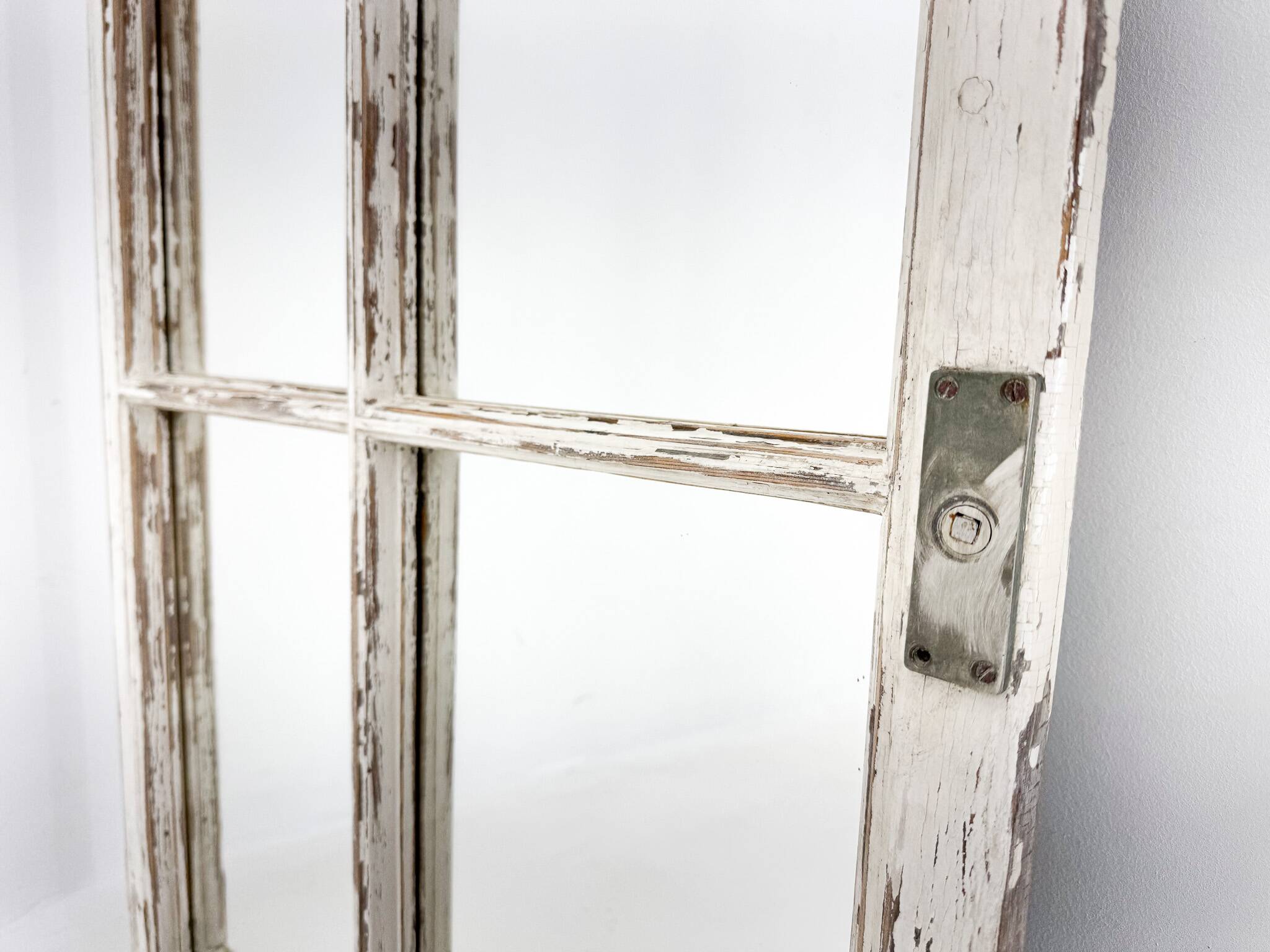 Vintage wooden window converted to a mirror