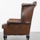 Fauteuil Chesterfield en cuir de vache marron de style anglais