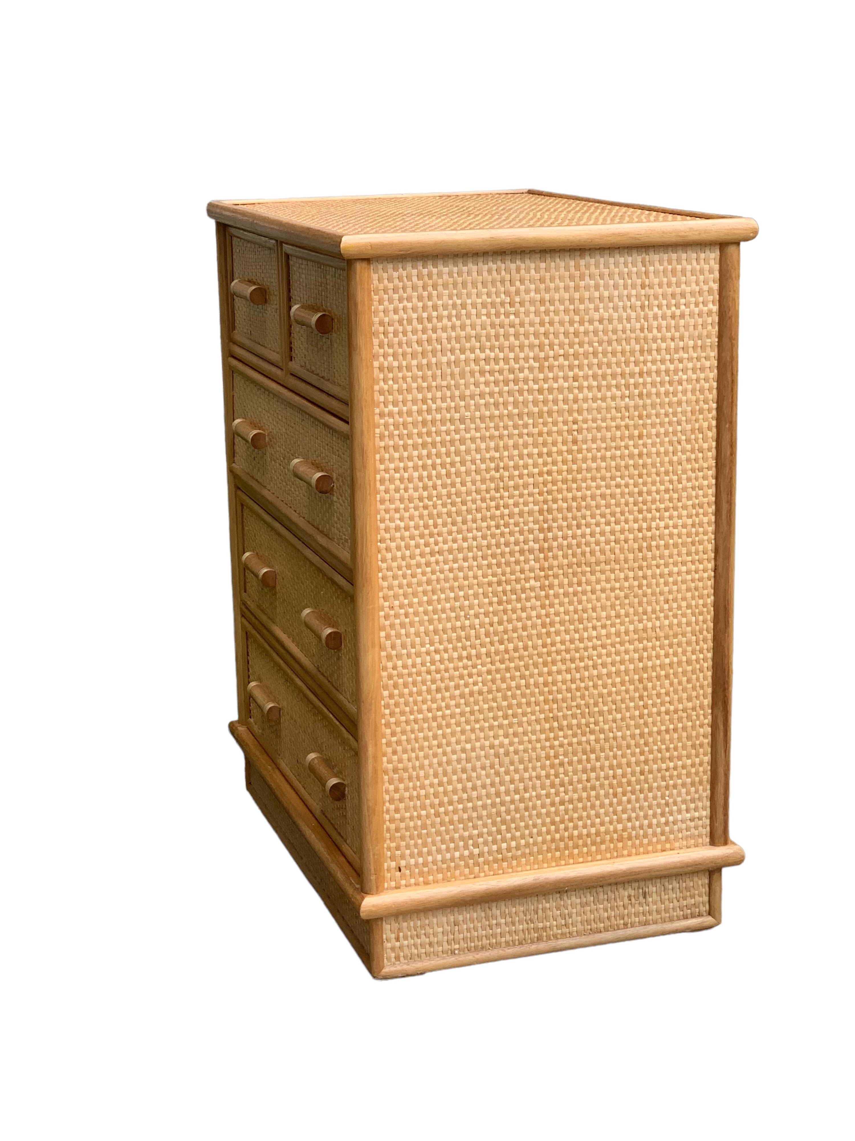 Rattan and woven wicker chest of drawers and mirror, 1970