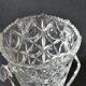 Vintage glass ice bucket stamped with a metal handle