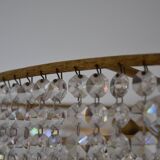 Old chandelier with tassels and brass
