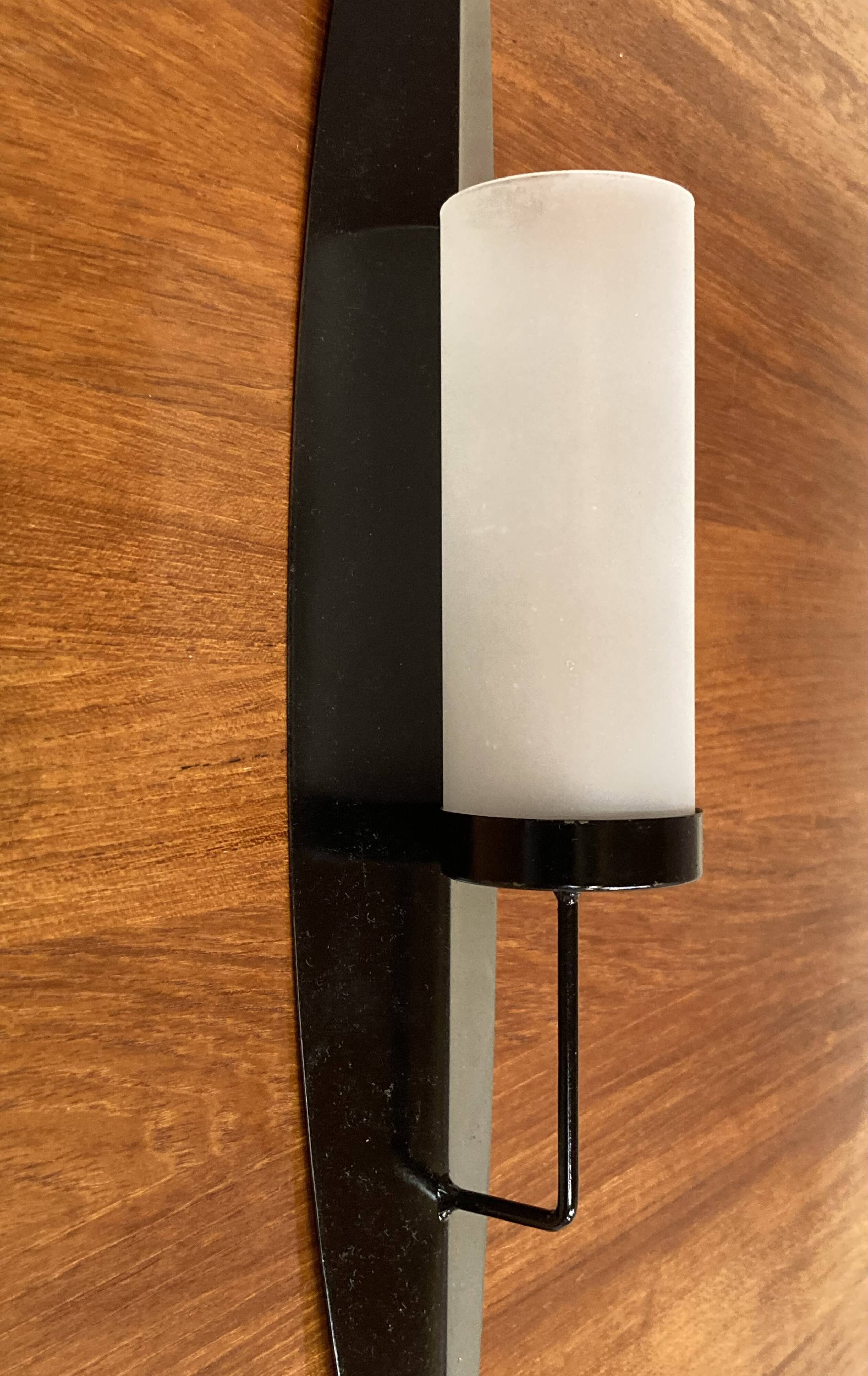 Pair of Scandinavian design candle holders in glass and metal.