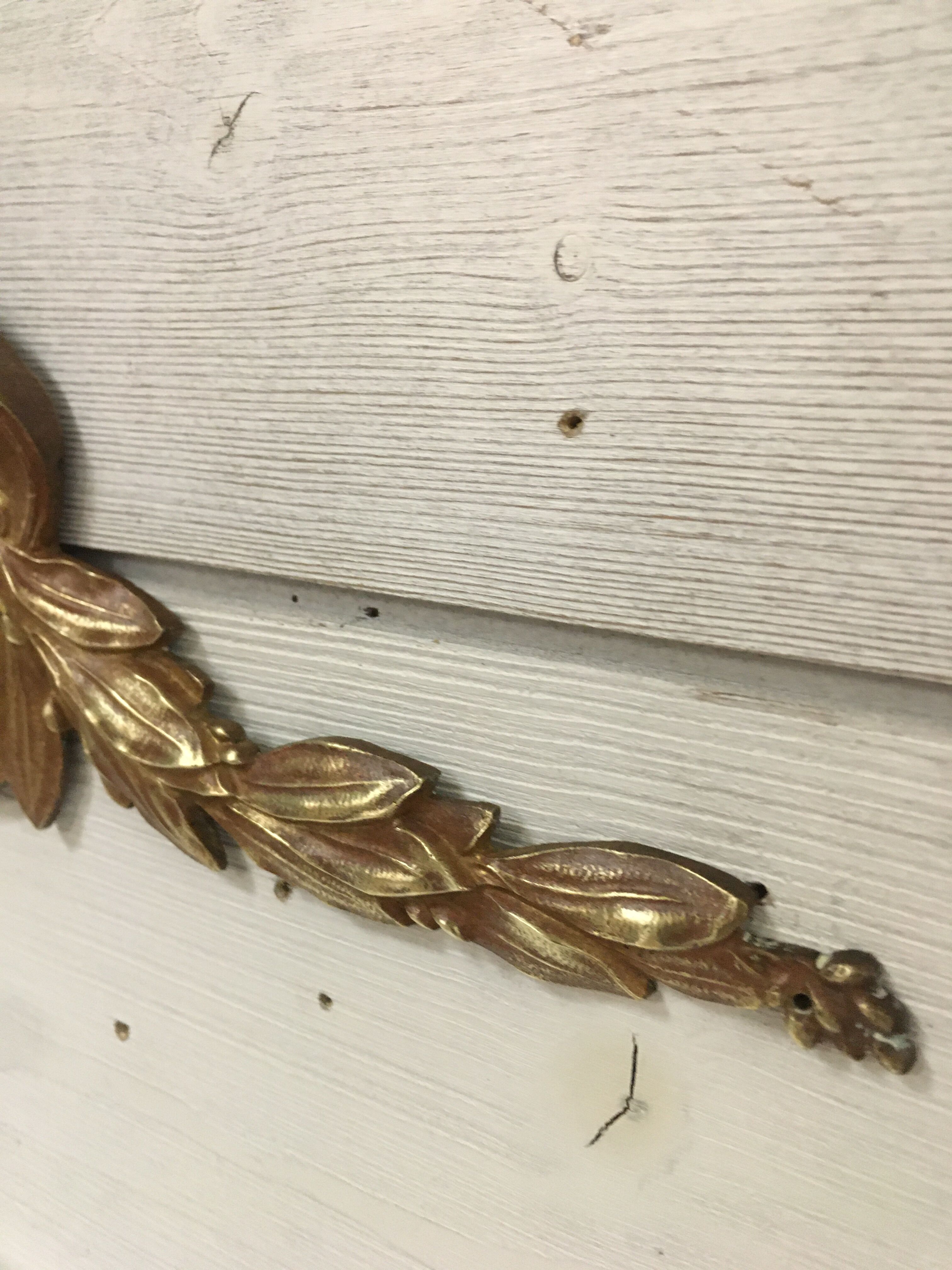 Bronze shell pediment