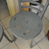 Pair of Thonet bistro chairs from 1930 in painted grey wood, half-moon backrest.