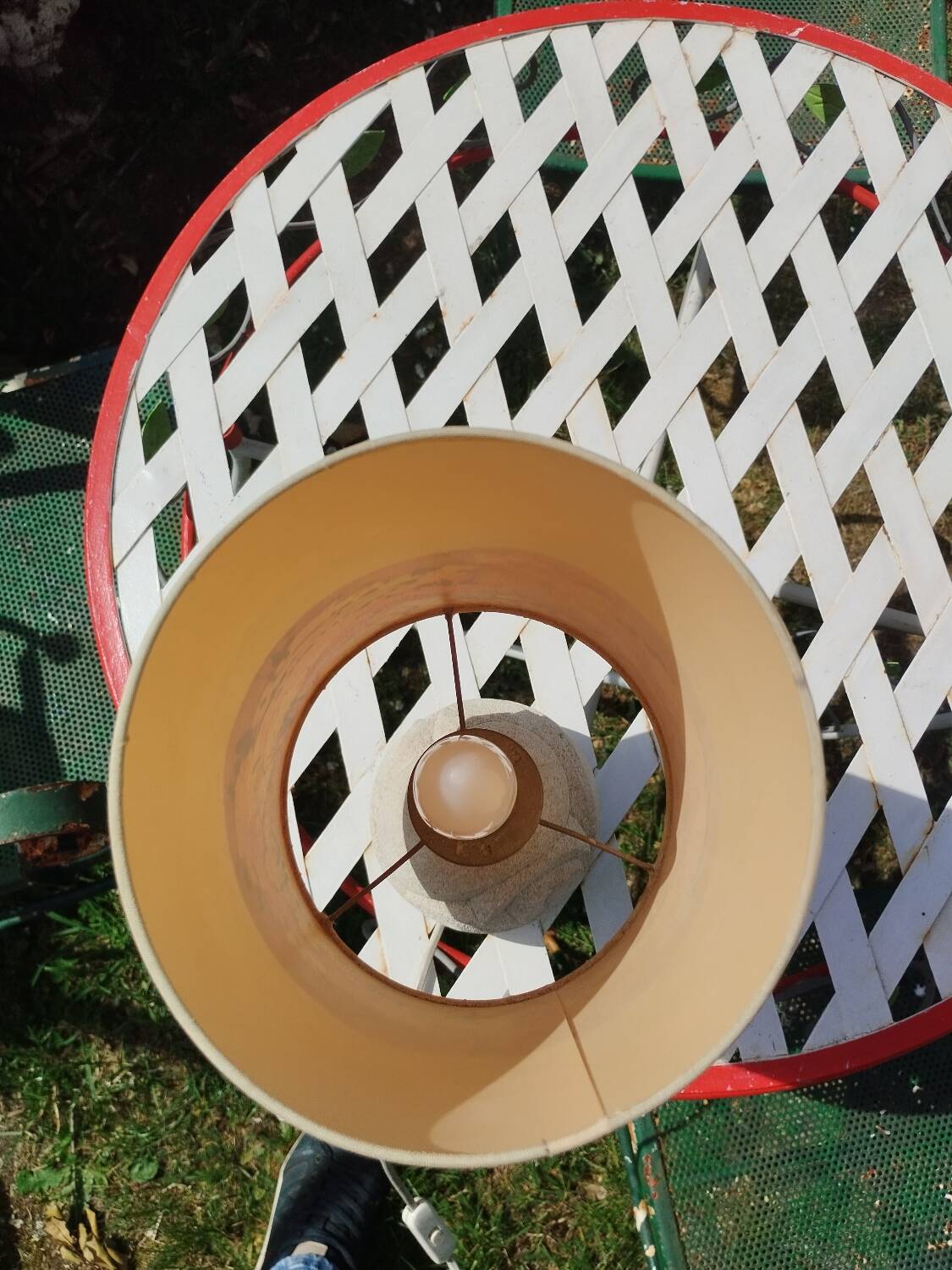 Vintage antique lamp with a stone base.
