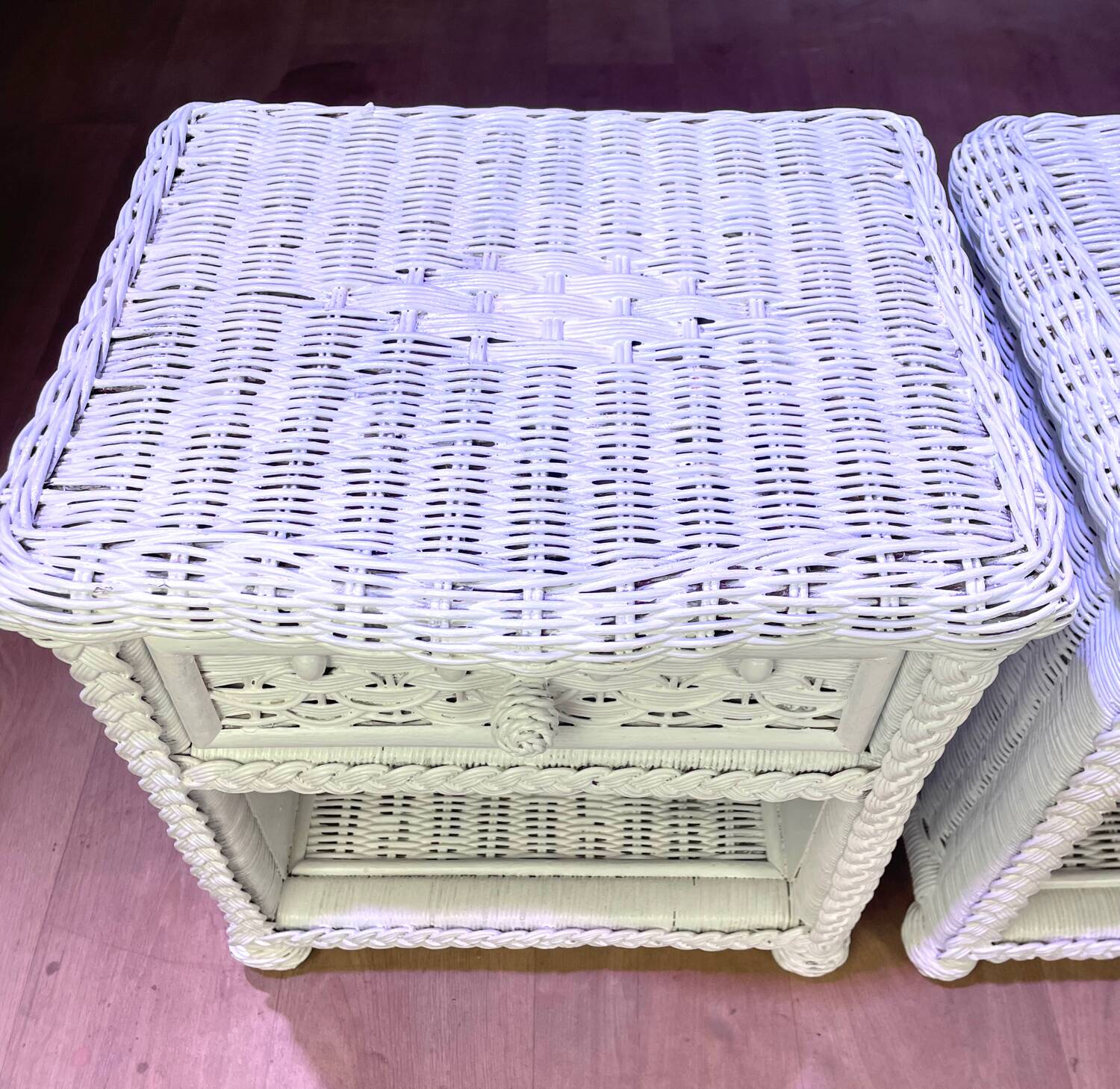 Pair of white lacquered rattan bedside tables