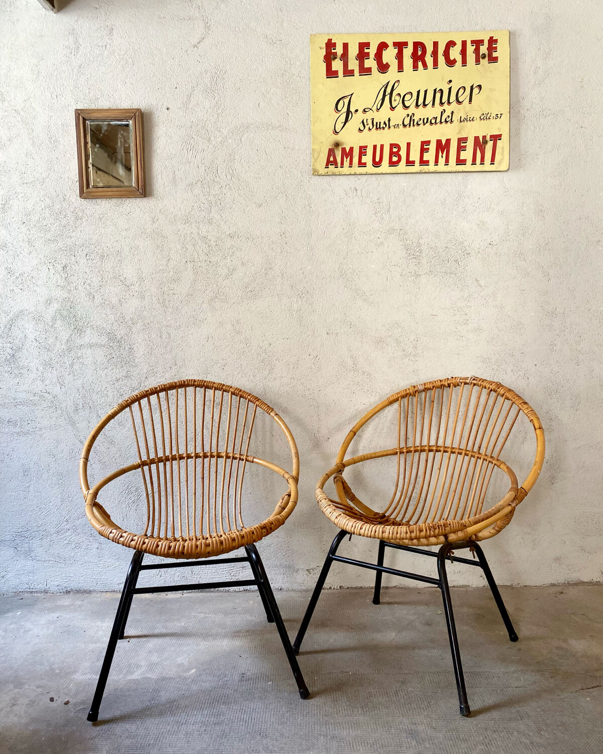Two rattan armchairs