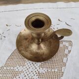 Hand candle holder called cellar rat in solid brass