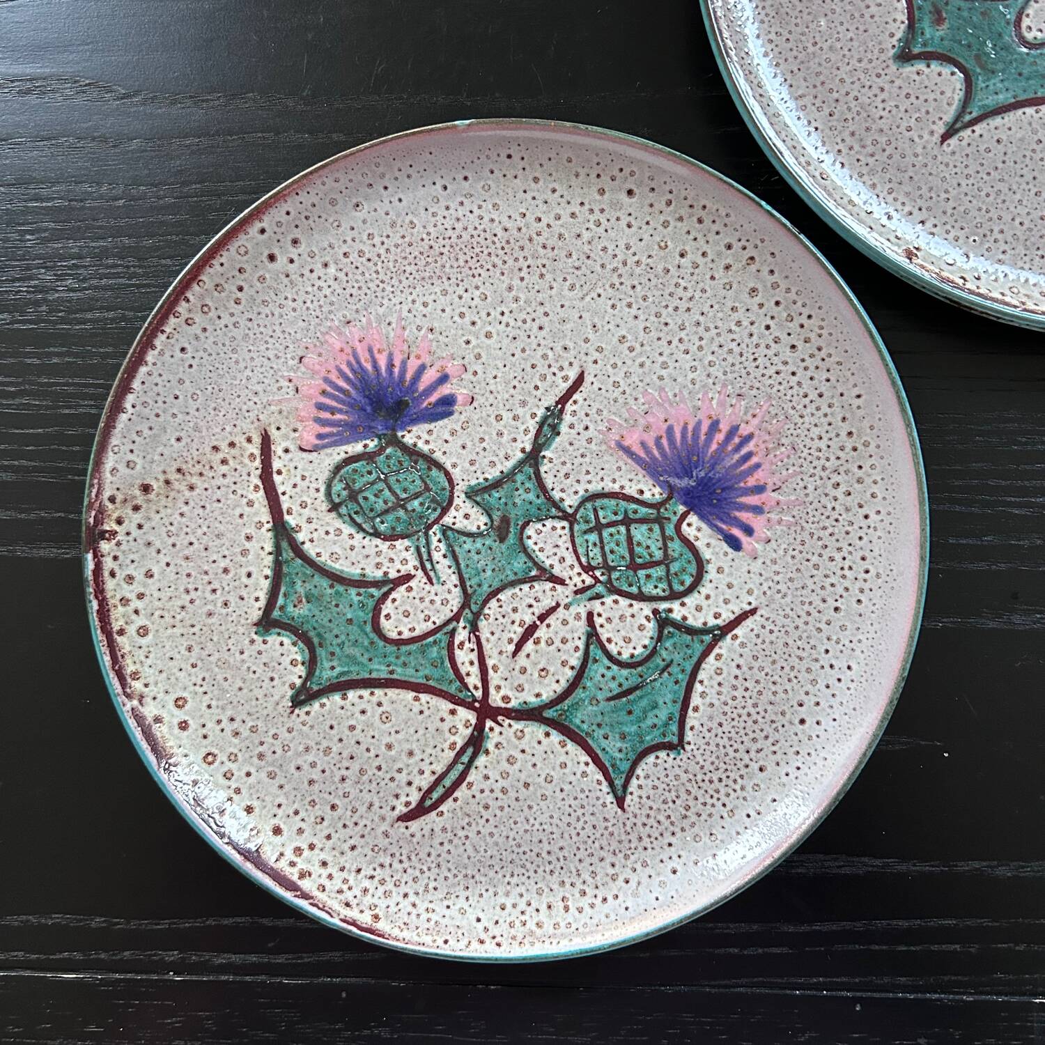 Pair of plates with thistle decoration